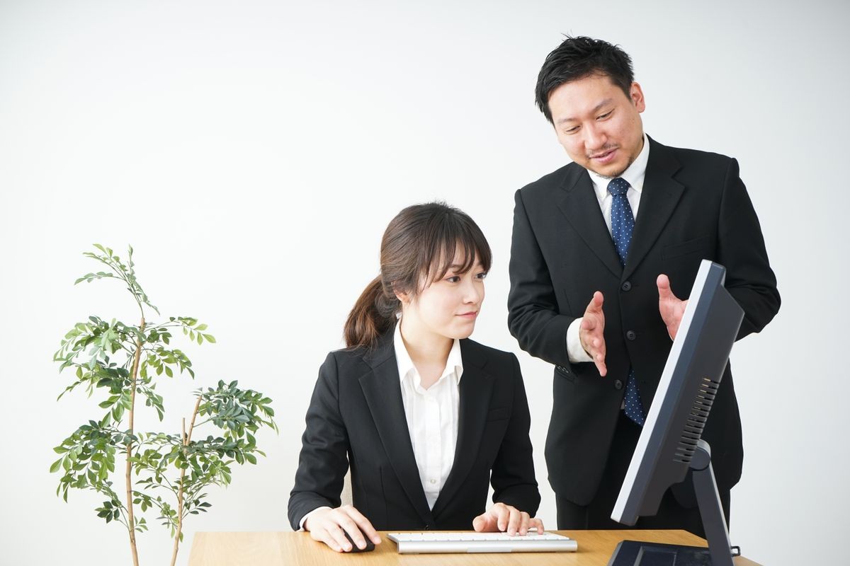 Young business woman and her tutor